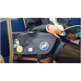 Borsa a tracolla in materiale riciclato da 22,5 litri Herschel Cove personalizzato con logo - Pubblienne